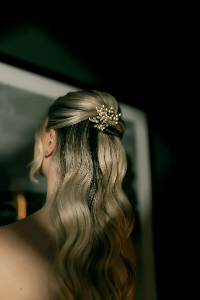 Half-up style with pearl pin